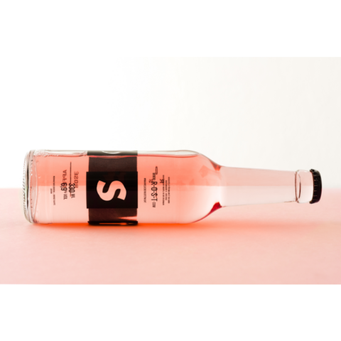 Steirisch-schenken ROST Rose-Wein/Apfel als Werbegeschenk in der 330ml Flasche liegend
